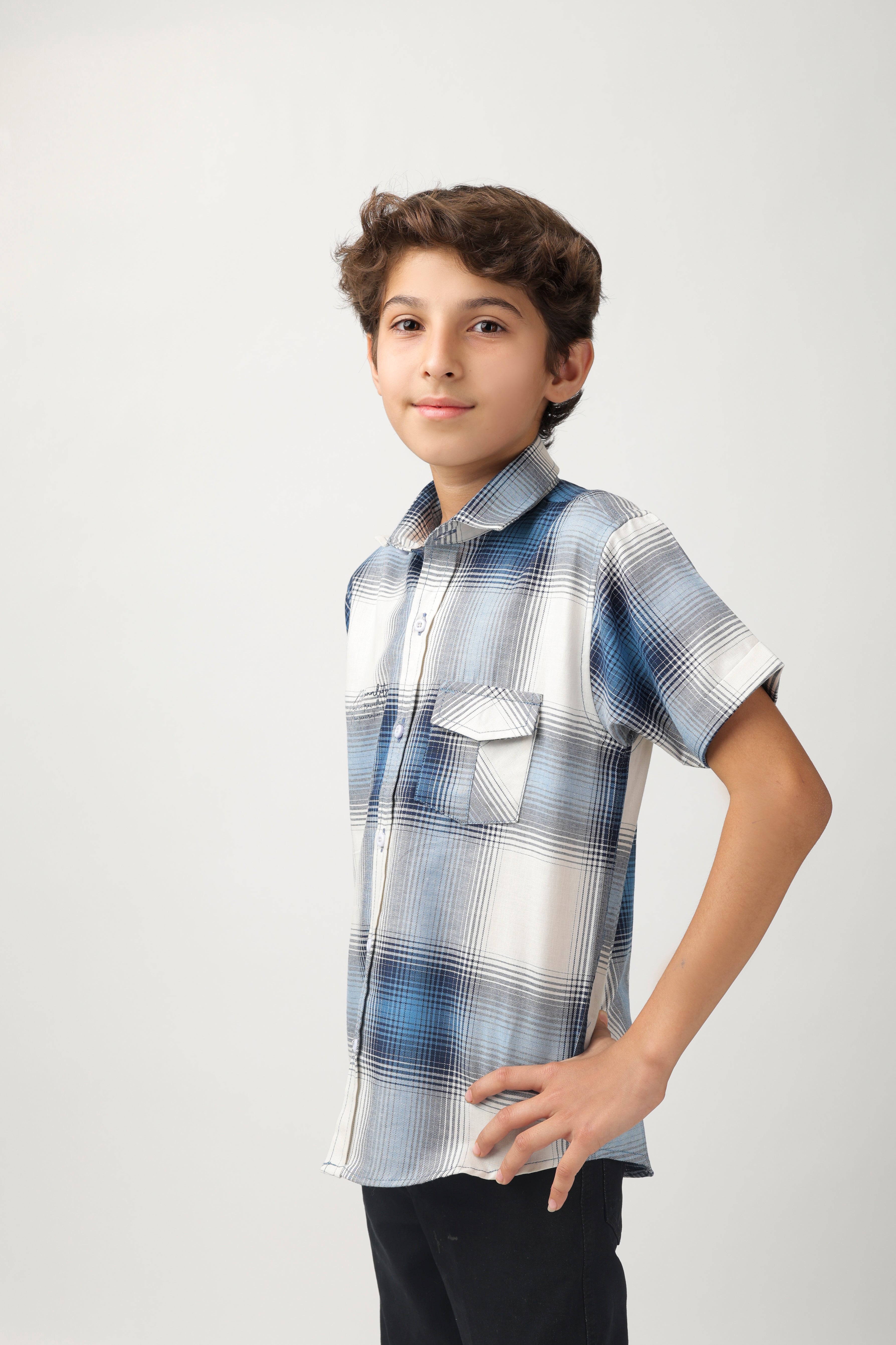 Boys' short-sleeve shirt features a classic blue and white checks
