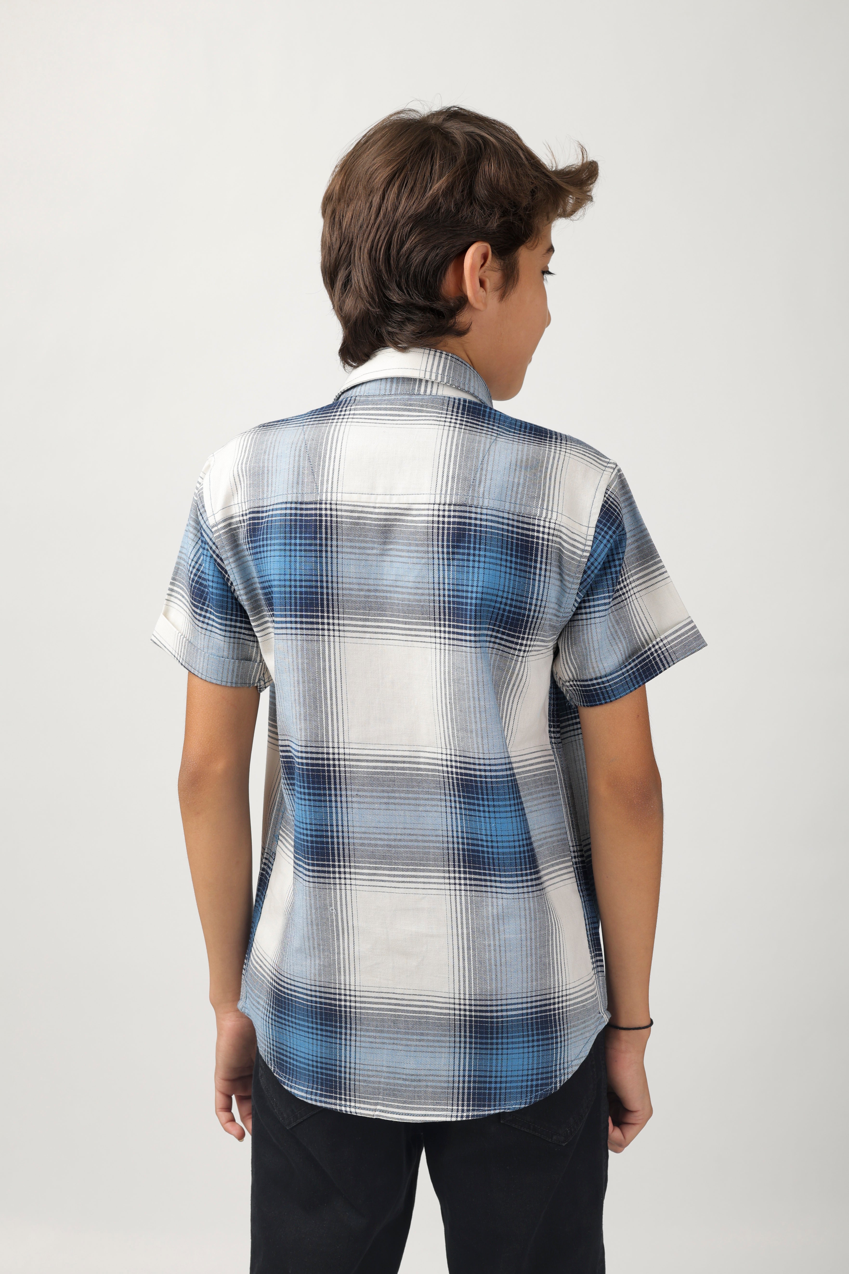 Boys' short-sleeve shirt features a classic blue and white checks