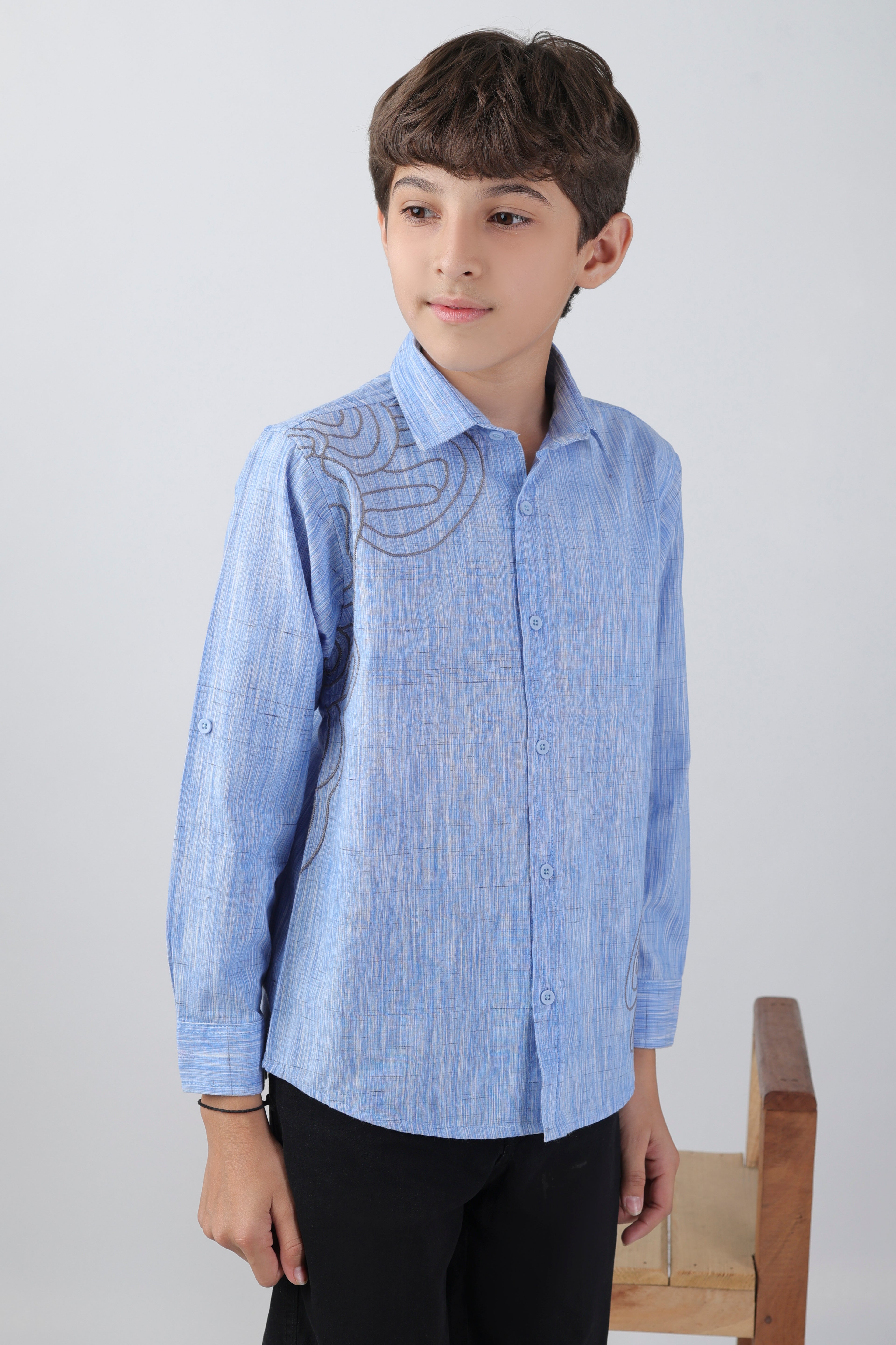 Boys' long sleeve shirt with a subtle embroidery pattern