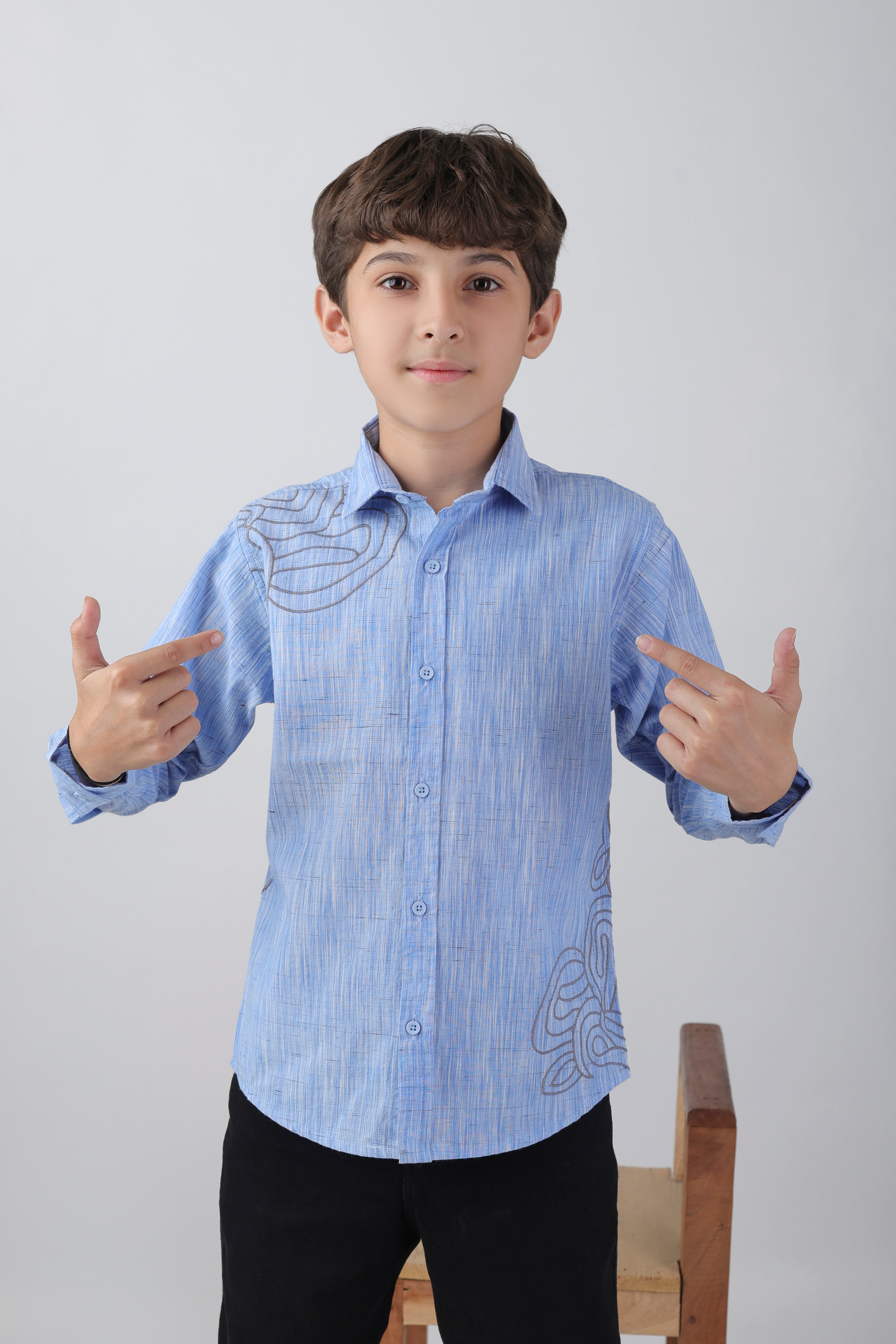 Boys' long sleeve shirt with a subtle embroidery pattern