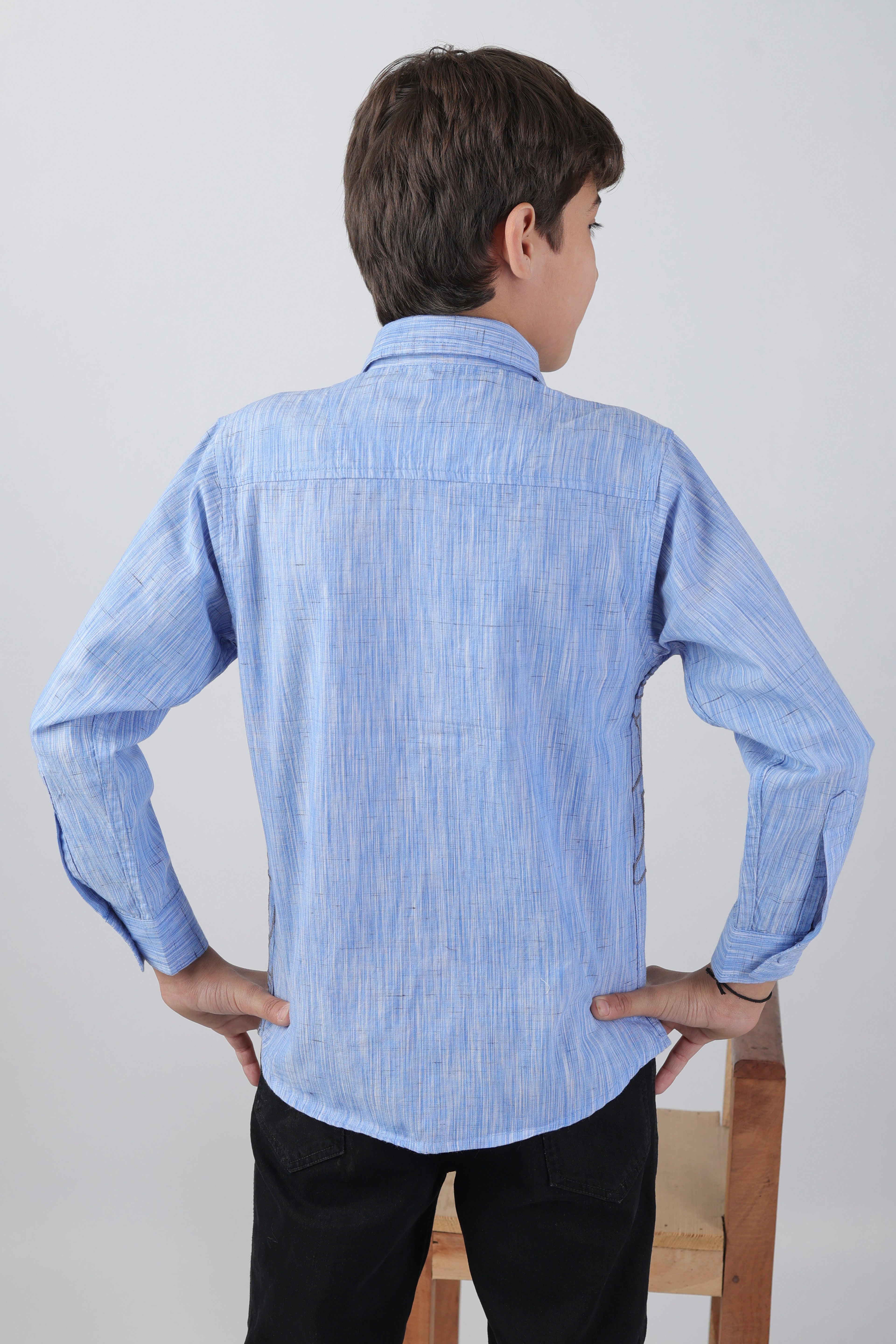 Boys' long sleeve shirt with a subtle embroidery pattern