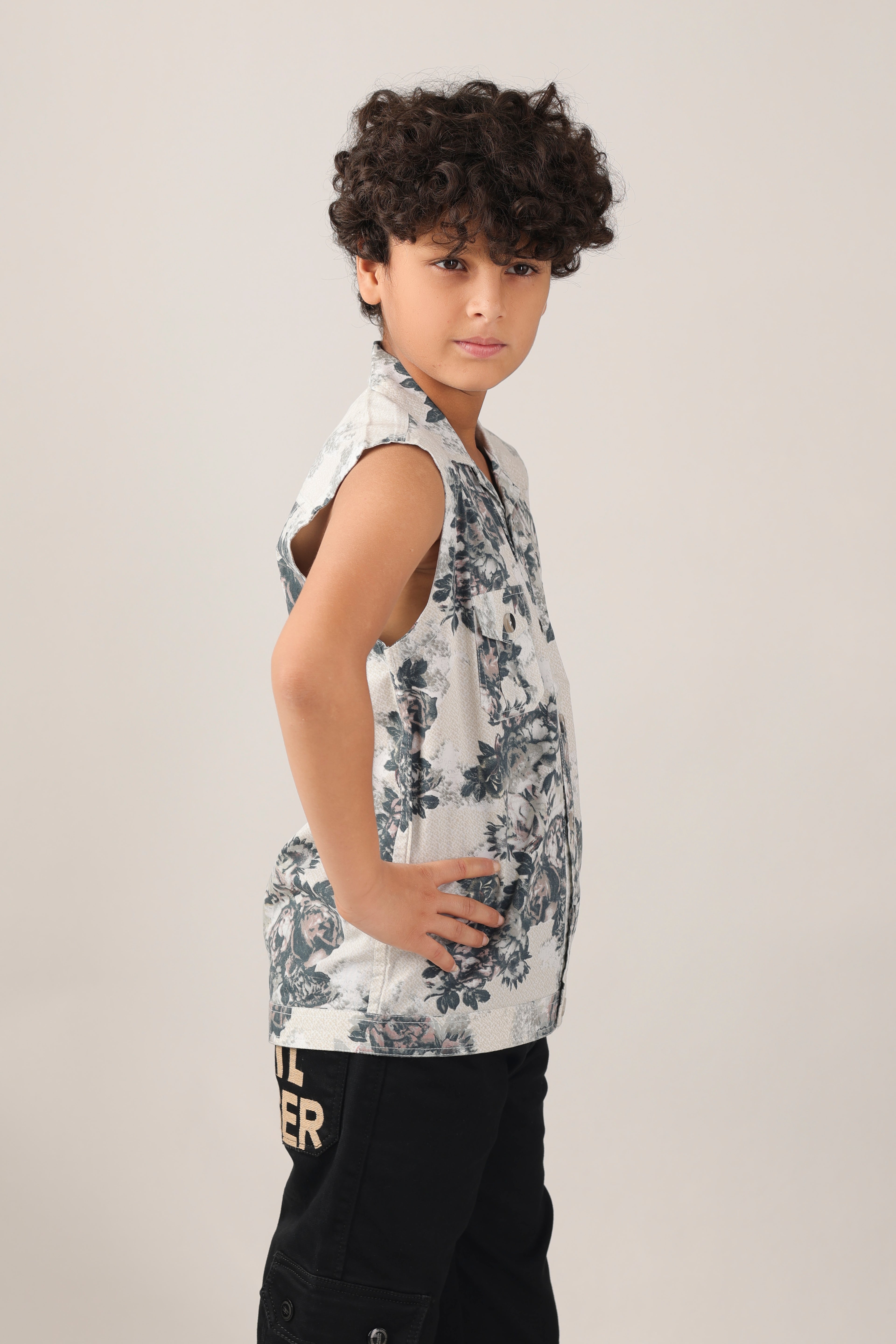 Boys' sleeveless over-shirt with over-all floral print