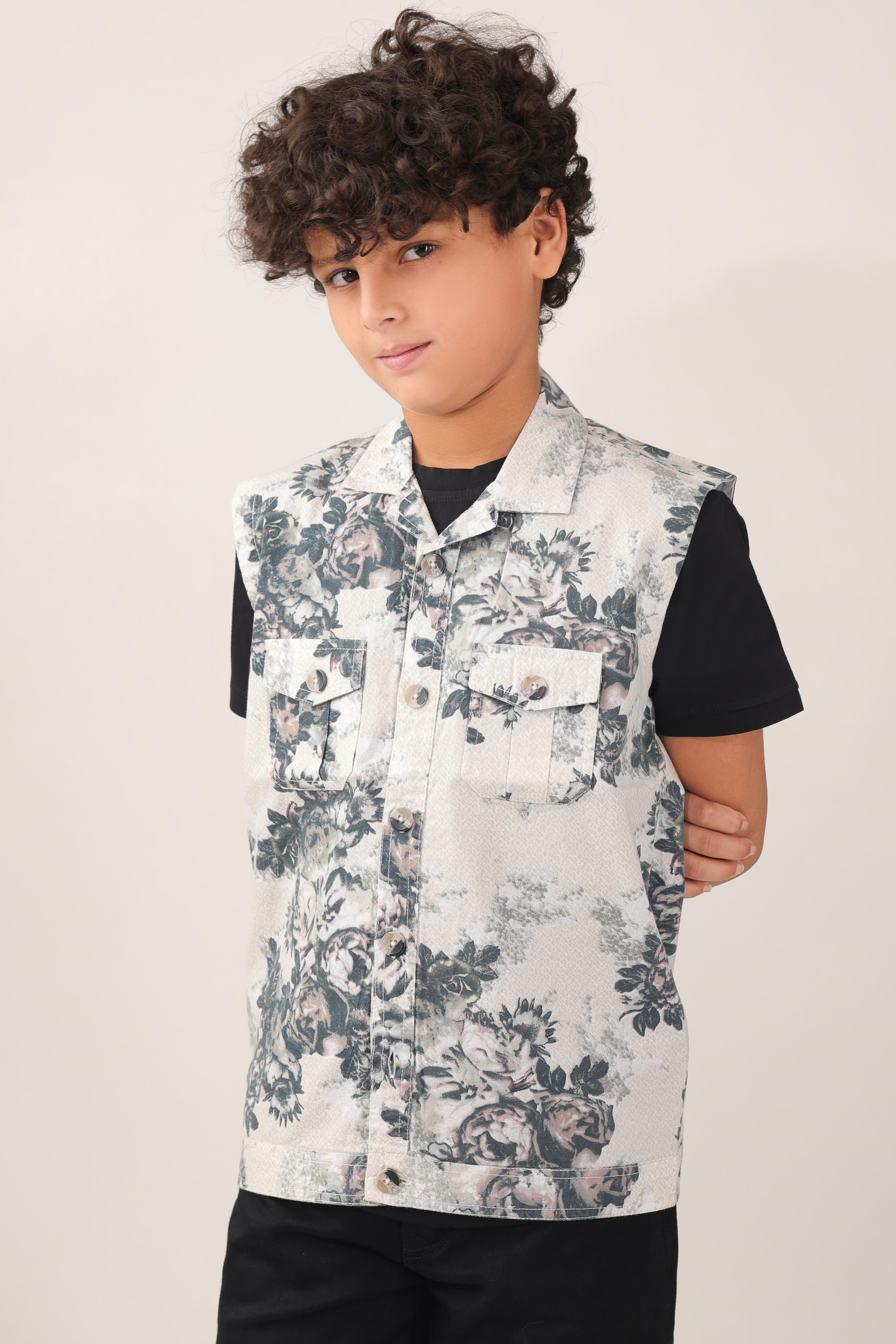 Boys' sleeveless over-shirt with over-all floral print