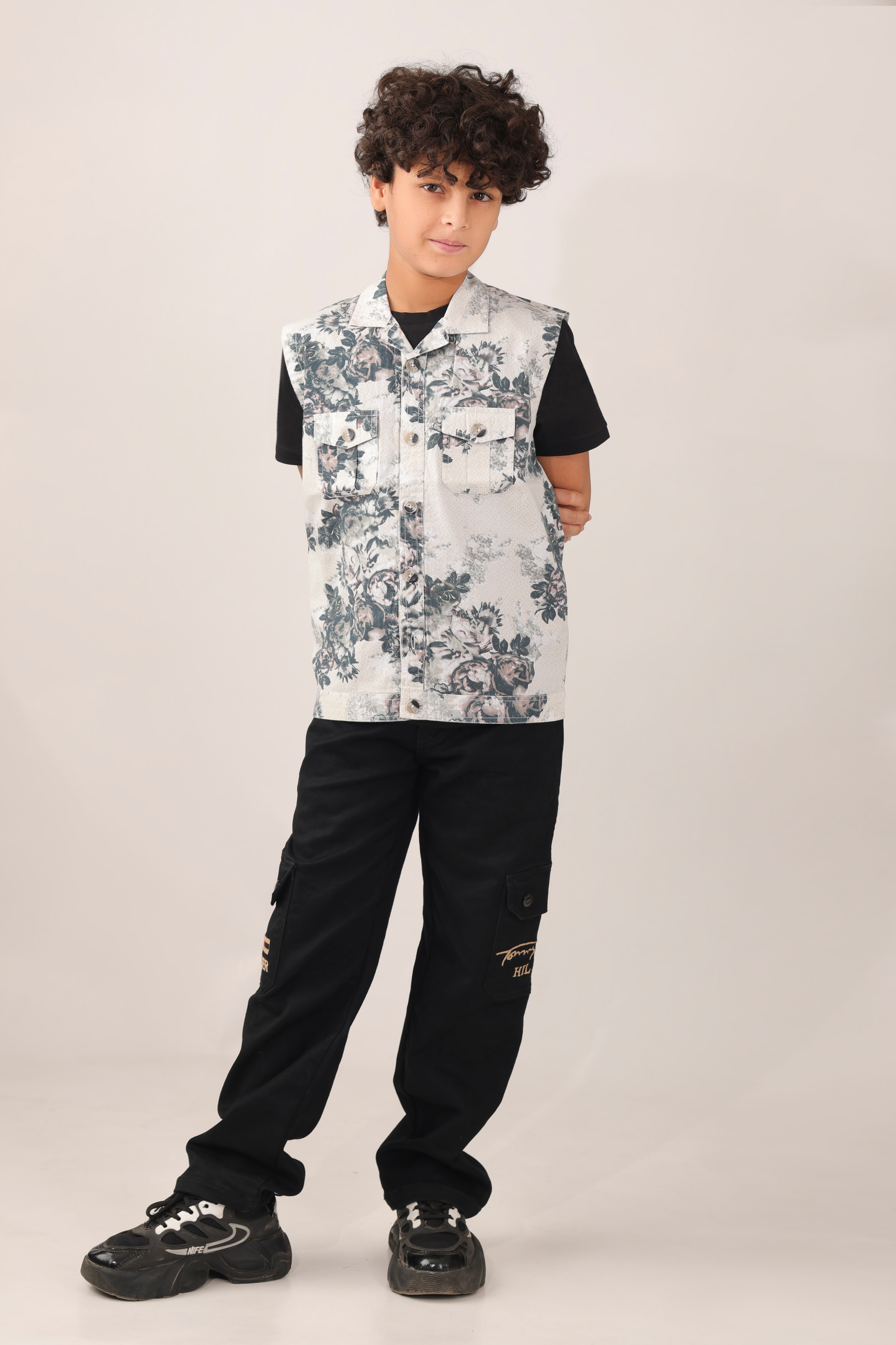 Boys' sleeveless over-shirt with over-all floral print