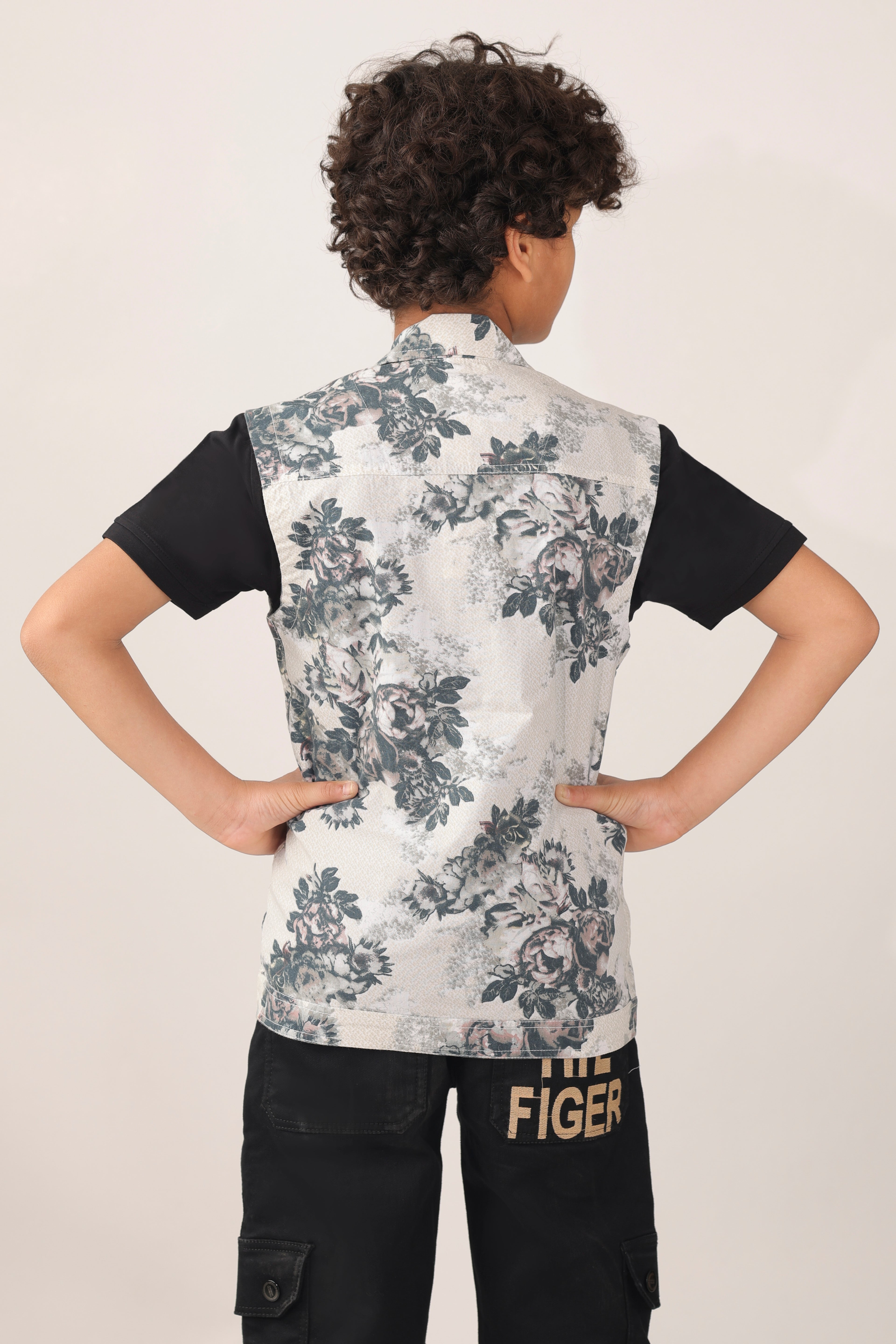 Boys' sleeveless over-shirt with over-all floral print