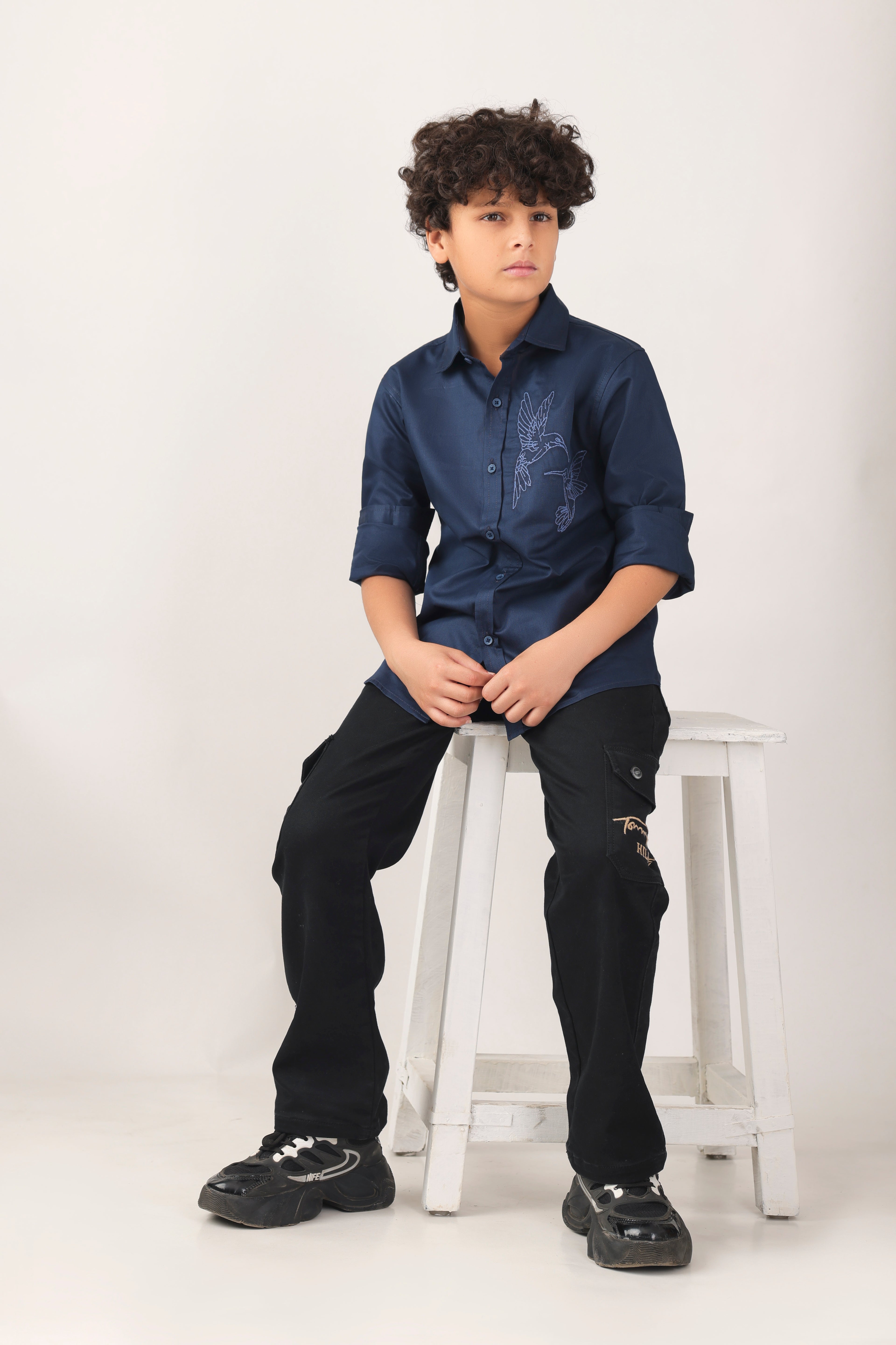 Classic button-down boys' shirt with embroidered motif