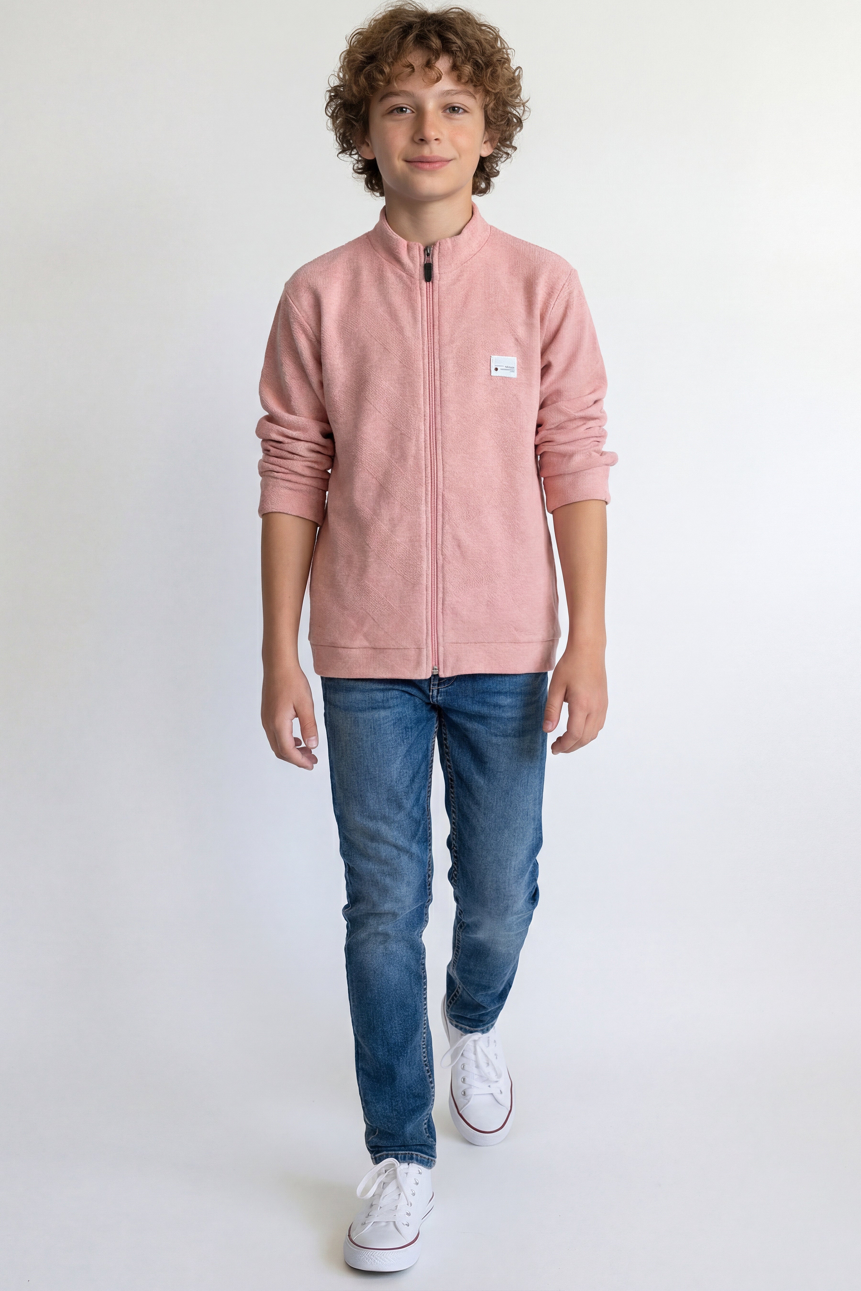 Boys' jacket with a full zip front and stand collar.