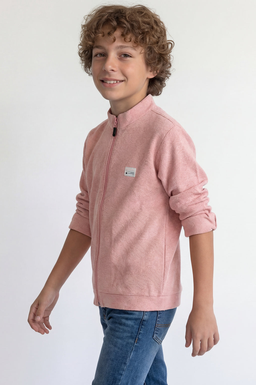 Boys' jacket with a full zip front and stand collar.