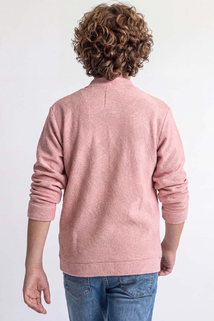 Boys' jacket with a full zip front and stand collar.