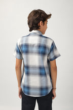 Boys' short-sleeve shirt features a classic blue and white checks