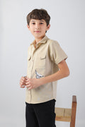 Boys' shirt with 2 flap pockets and an embroidered detail
