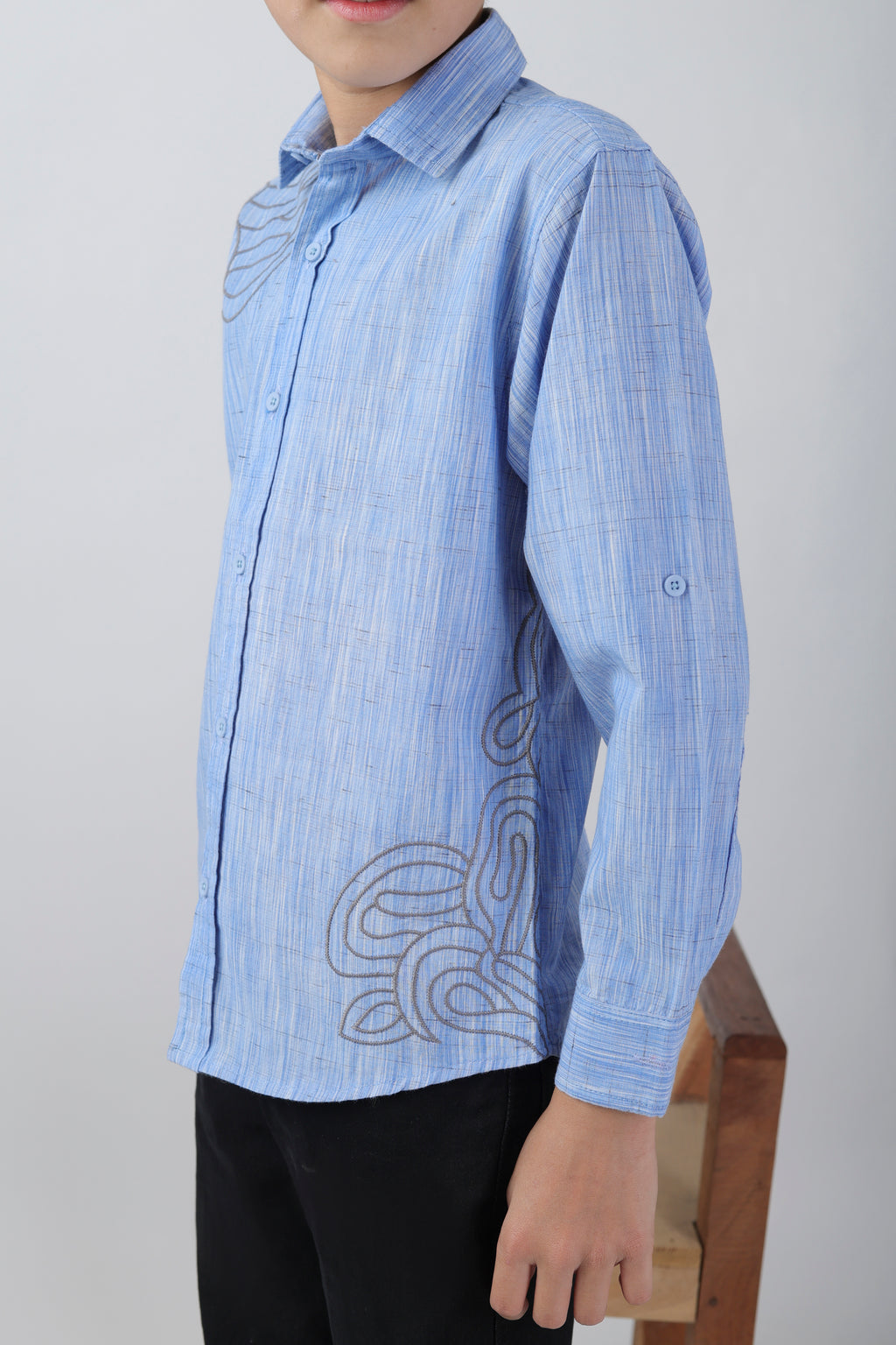 Boys' long sleeve shirt with a subtle embroidery pattern