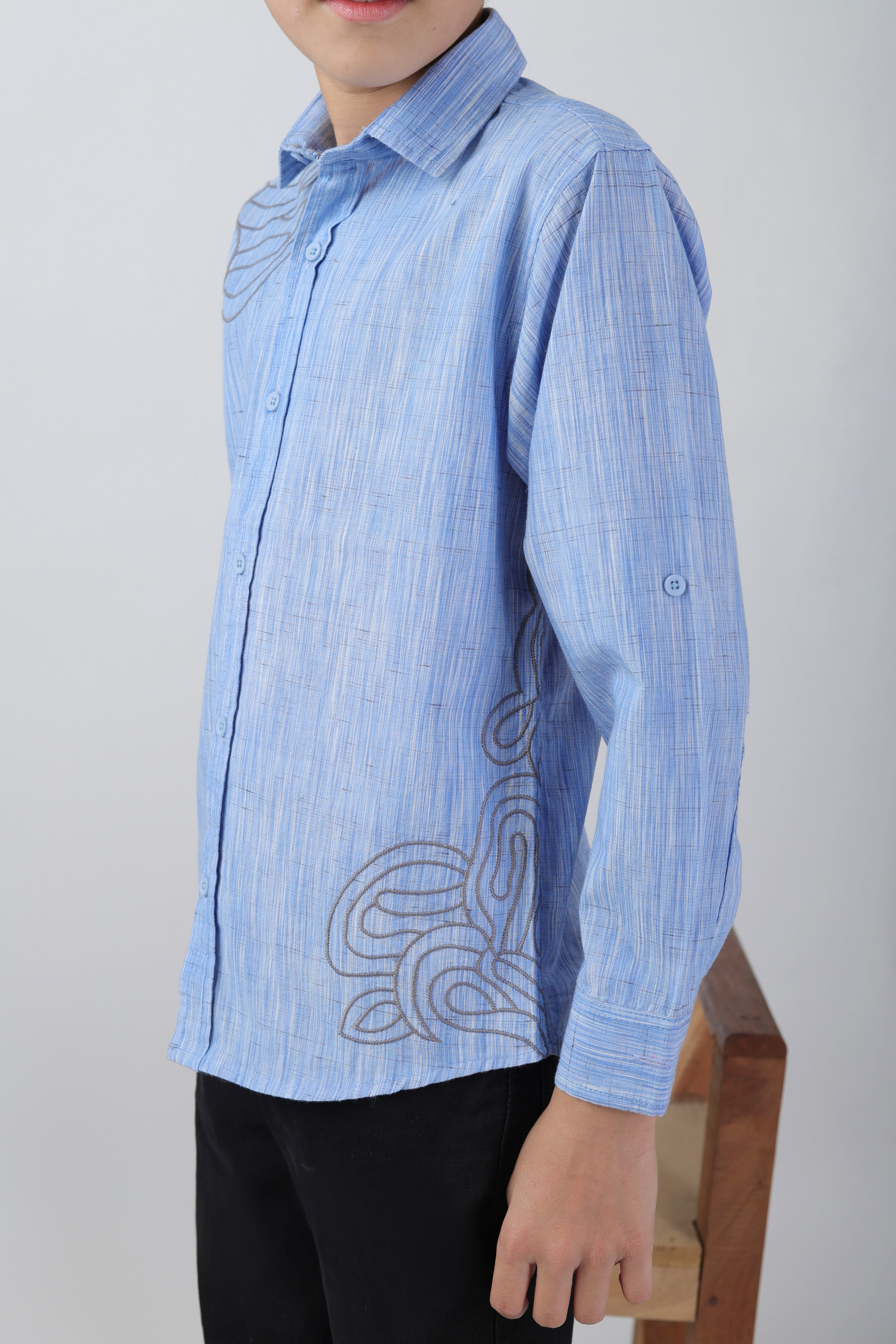 Boys' long sleeve shirt with a subtle embroidery pattern